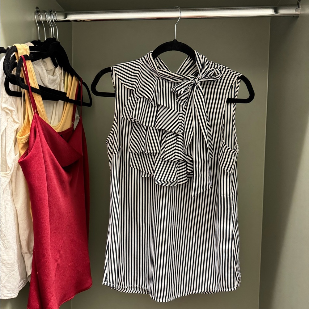 Striped top with ruffles and bow